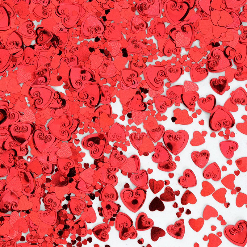 Confettis de table coeurs rouges métallisés