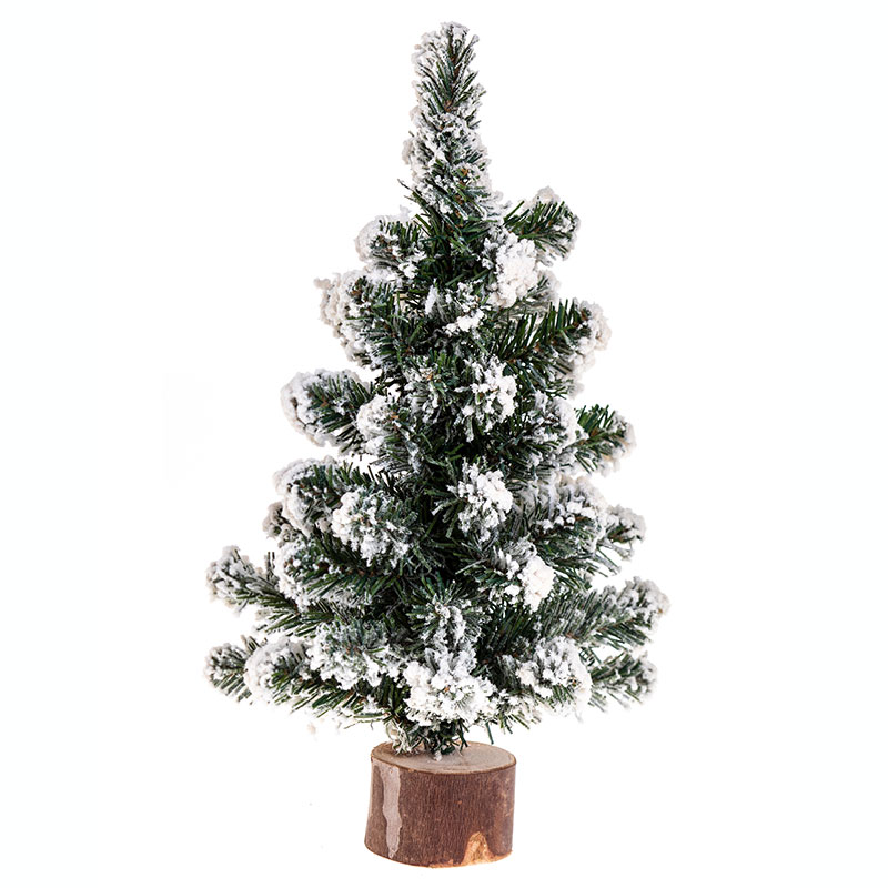 Sapin de No&euml;l enneig&eacute; sur rondin